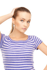 Image showing lovely woman in striped sweater