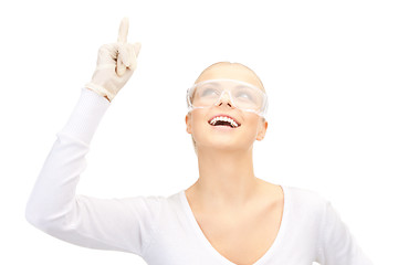 Image showing woman in protective glasses and gloves