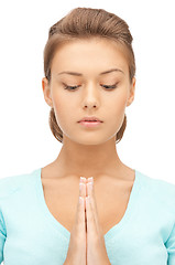 Image showing praying businesswoman