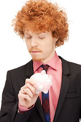 Image showing man with piggy bank