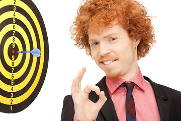 Image showing businessman with dart and target