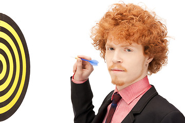 Image showing businessman with dart and target