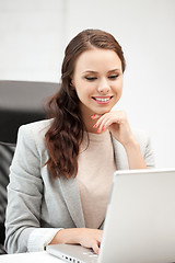 Image showing happy woman with laptop computer