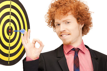 Image showing businessman with dart and target