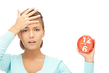 Image showing woman holding alarm clock