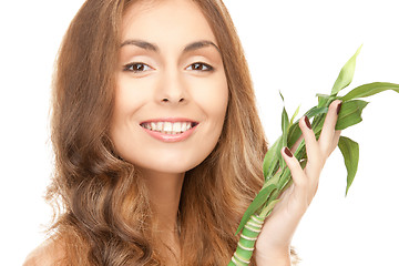 Image showing woman with green sprout