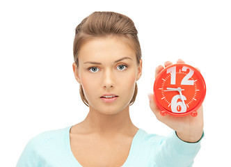 Image showing woman holding alarm clock