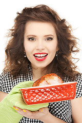 Image showing lovely housewife with meat