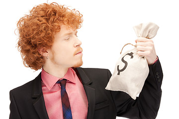 Image showing man with dollar signed bag