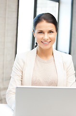 Image showing happy woman with laptop computer