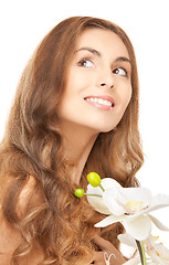 Image showing beautiful woman with orchid flower