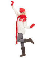 Image showing beautiful woman in hat, muffler and mittens