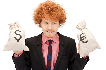 Image showing man with euro and dollar bags