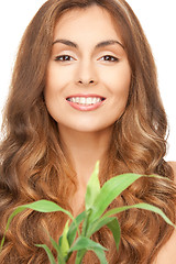 Image showing woman with green sprout