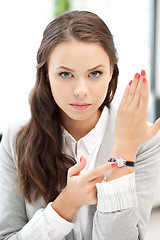 Image showing businesswoman with watch