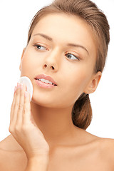 Image showing beautiful woman with cotton pad