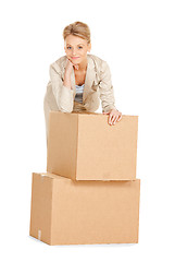 Image showing attractive businesswoman with big boxes