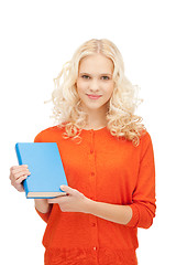 Image showing happy and smiling woman with book