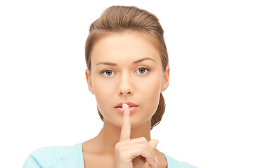 Image showing finger on lips