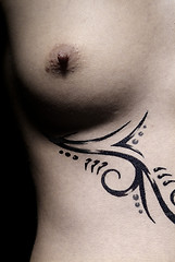 Image showing female breast and tattoo