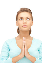 Image showing praying businesswoman