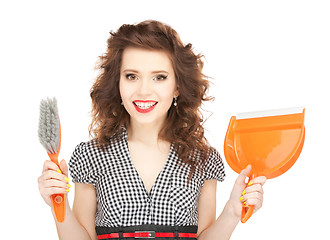 Image showing beautiful woman with cleaning sweep
