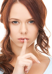 Image showing finger on lips