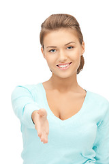 Image showing woman with an open hand ready for handshake