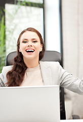 Image showing happy woman with laptop computer