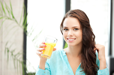 Image showing beautiful woman with glass of juice