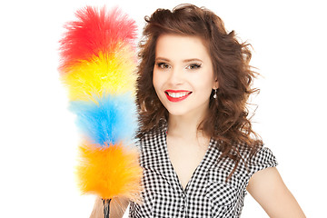 Image showing beautiful woman with cleaning sweep