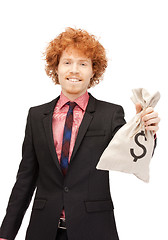 Image showing man with dollar signed bag