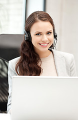 Image showing helpline operator with laptop computer