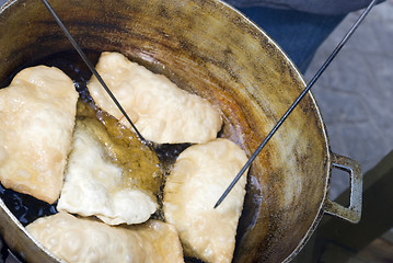 Image showing empanadas cooking