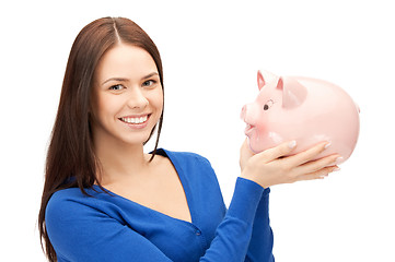 Image showing lovely woman with piggy bank