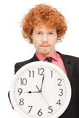 Image showing man with clock