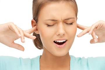 Image showing woman with fingers in ears