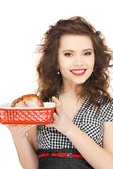 Image showing lovely housewife with meat