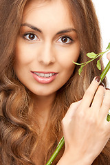 Image showing woman with green sprout