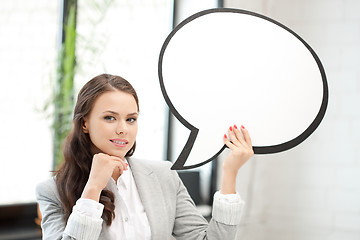 Image showing smiling businesswoman with blank text bubble