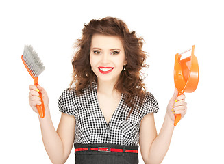 Image showing beautiful woman with cleaning sweep