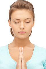 Image showing praying businesswoman