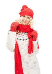 Image showing beautiful woman in hat, muffler and mittens