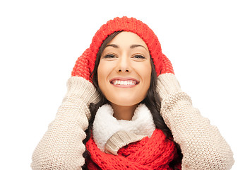 Image showing beautiful woman in hat, muffler and mittens