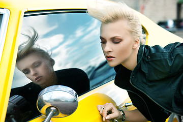 Image showing fashionable woman with yellow car