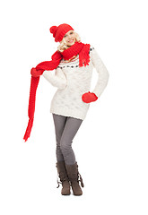 Image showing beautiful woman in hat, muffler and mittens