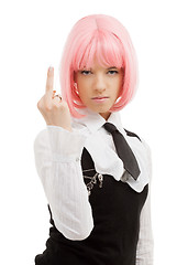 Image showing schoolgirl with pink hair showing middle finger