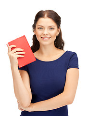 Image showing happy and smiling woman with book