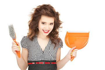 Image showing beautiful woman with cleaning sweep