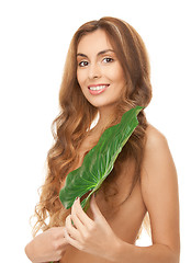 Image showing woman with green leaf